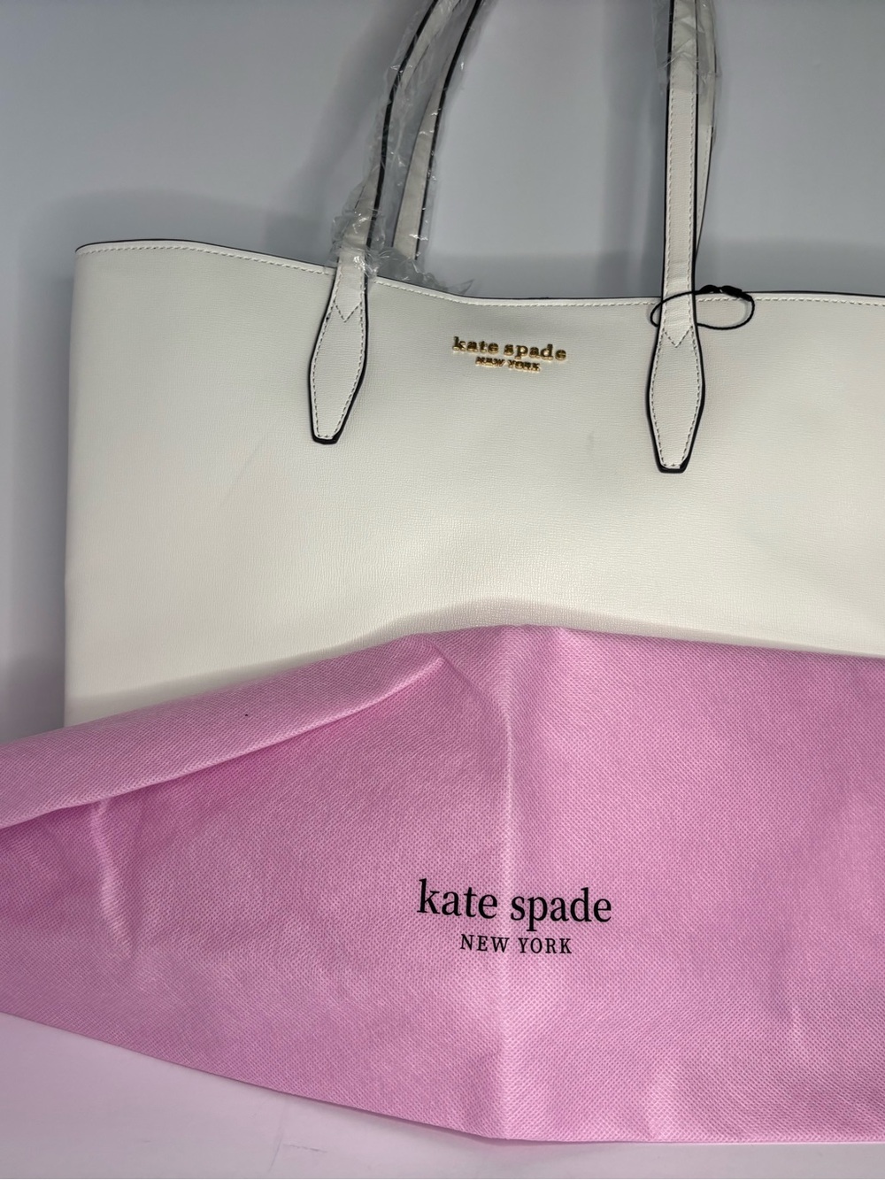 kate spade white leather tote with gold logo detail
